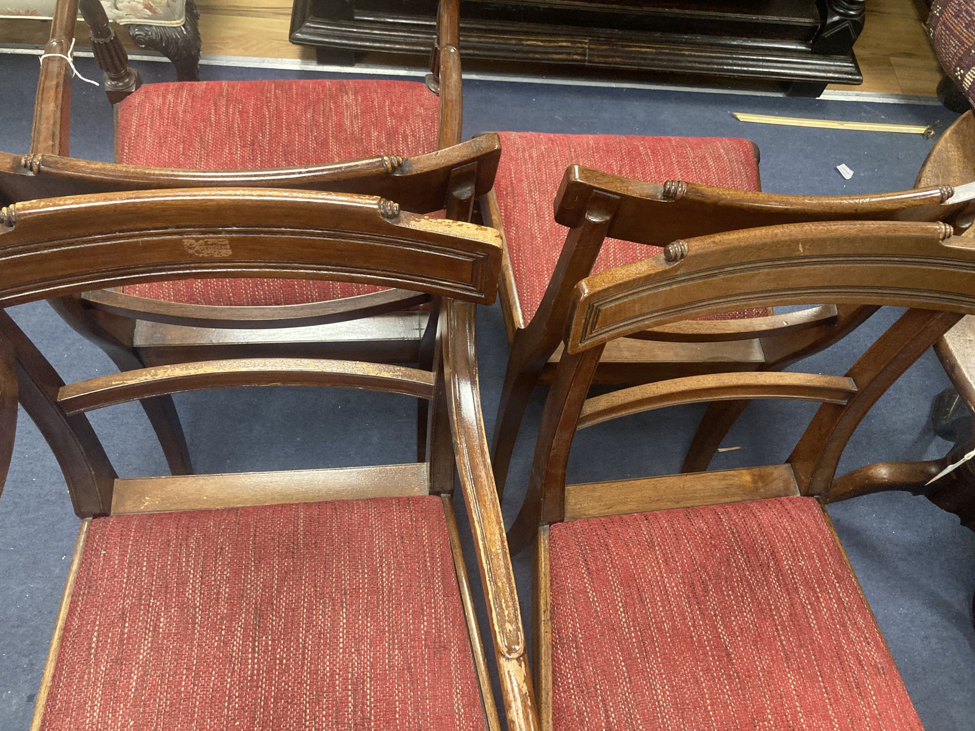 A set of eight Regency style mahogany dining chairs (two with arms)